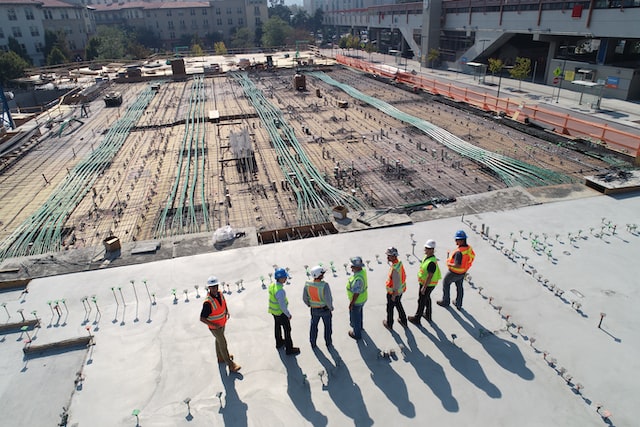 construction people looking over construction site